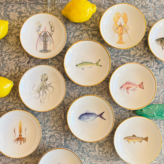 Porzellanschälchen mit Hummer- Motiv und Goldrand.