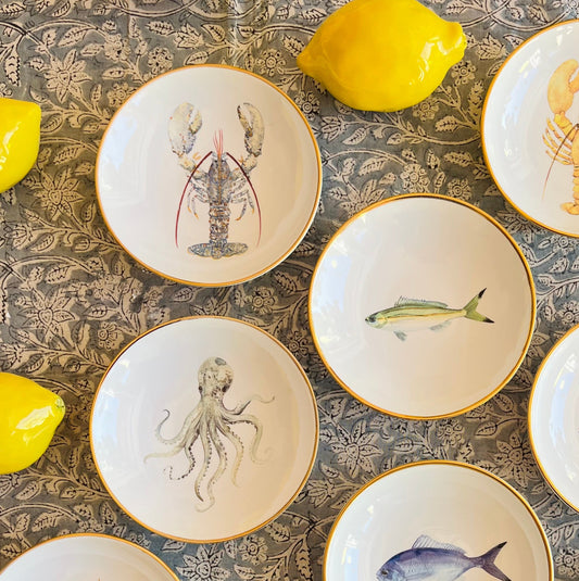 Porzellanschälchen mit Oktopus- Motiv und Goldrand.