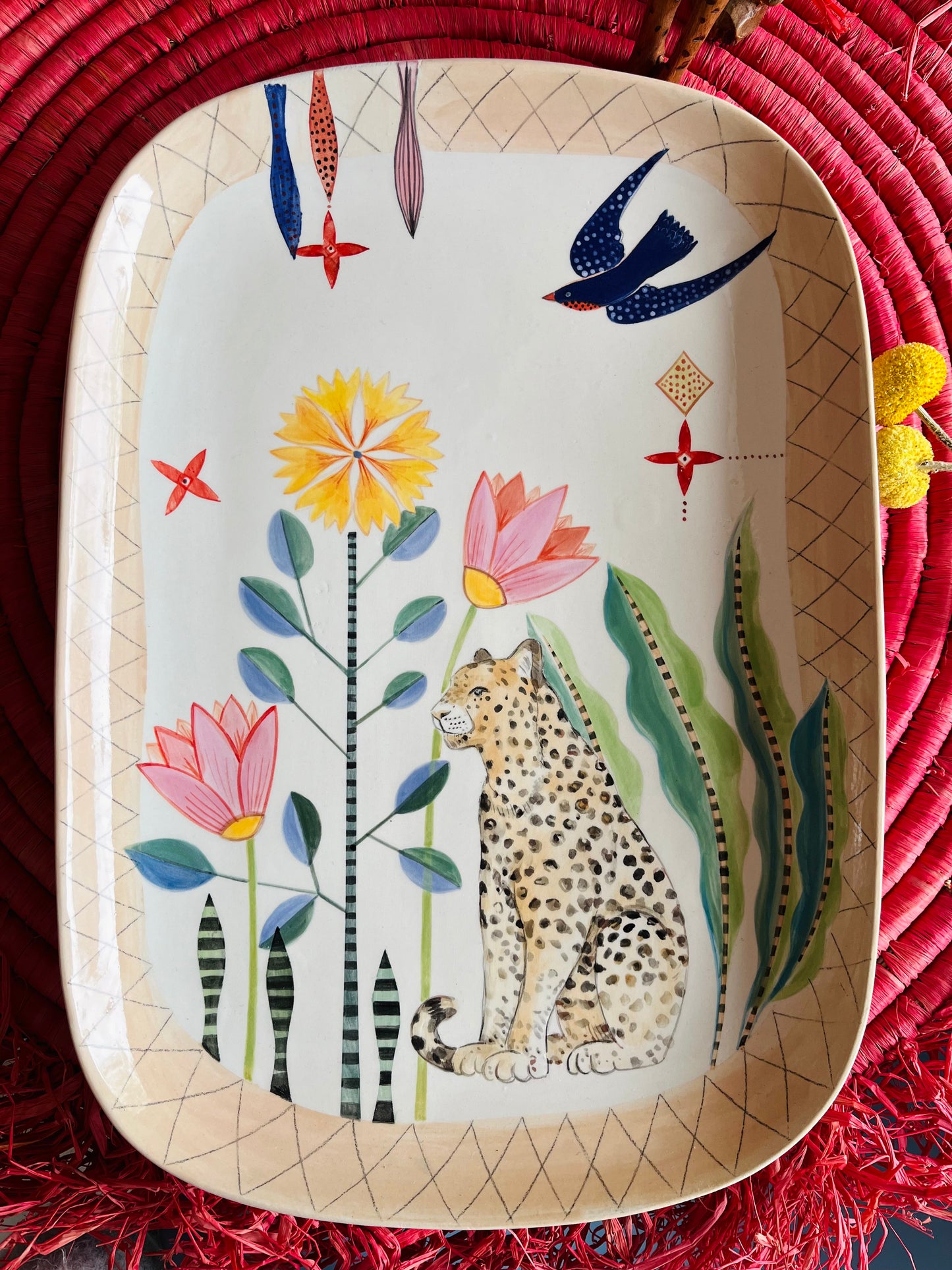 Keramikplatte "Leopard unter Blumen"